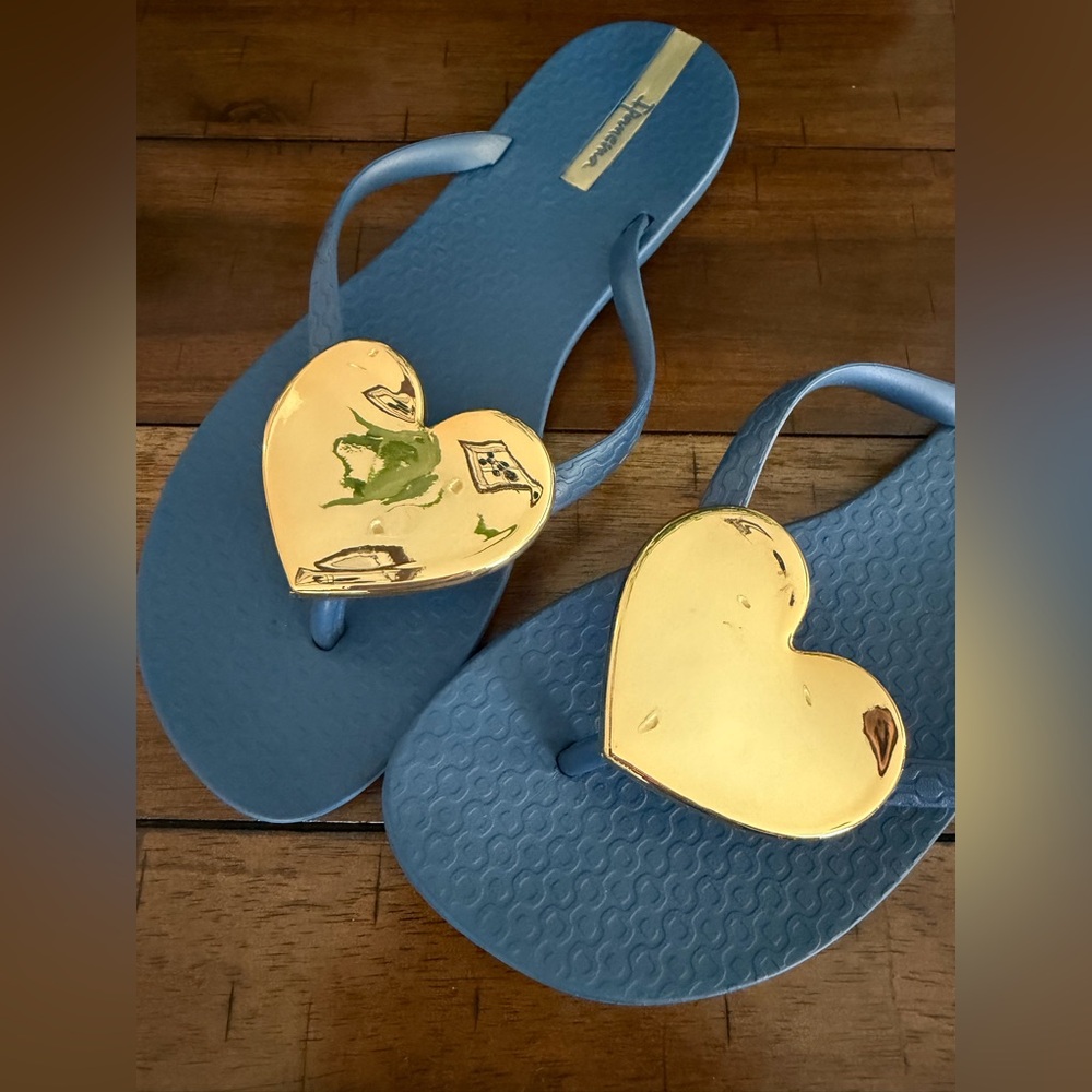 Ipanema Blue Flip Flops with Gold Heart Accent 
7